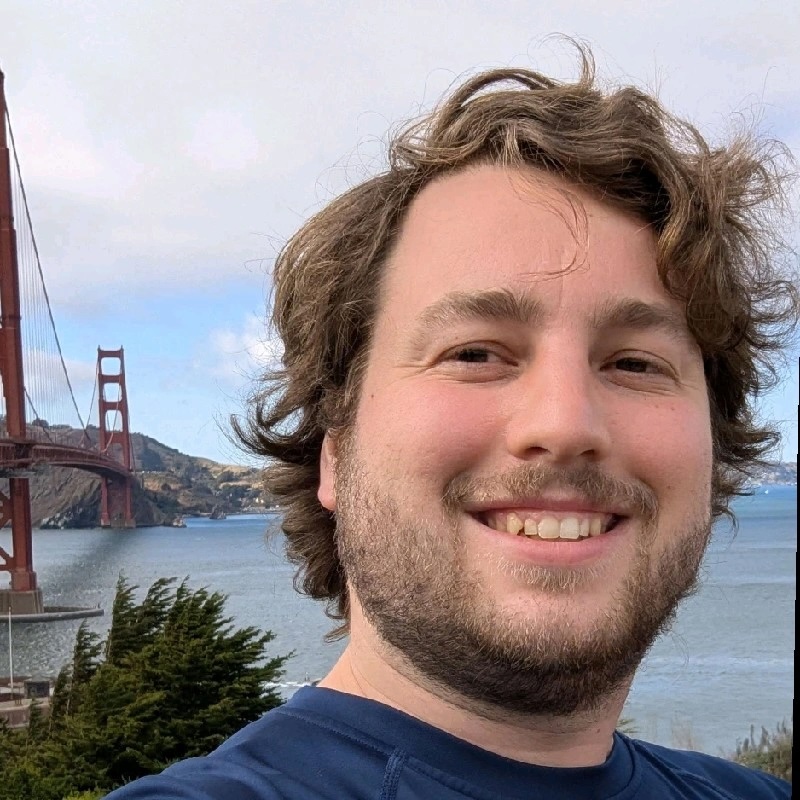 Nathan Bradshaw in front of the Golden Gate Bridge